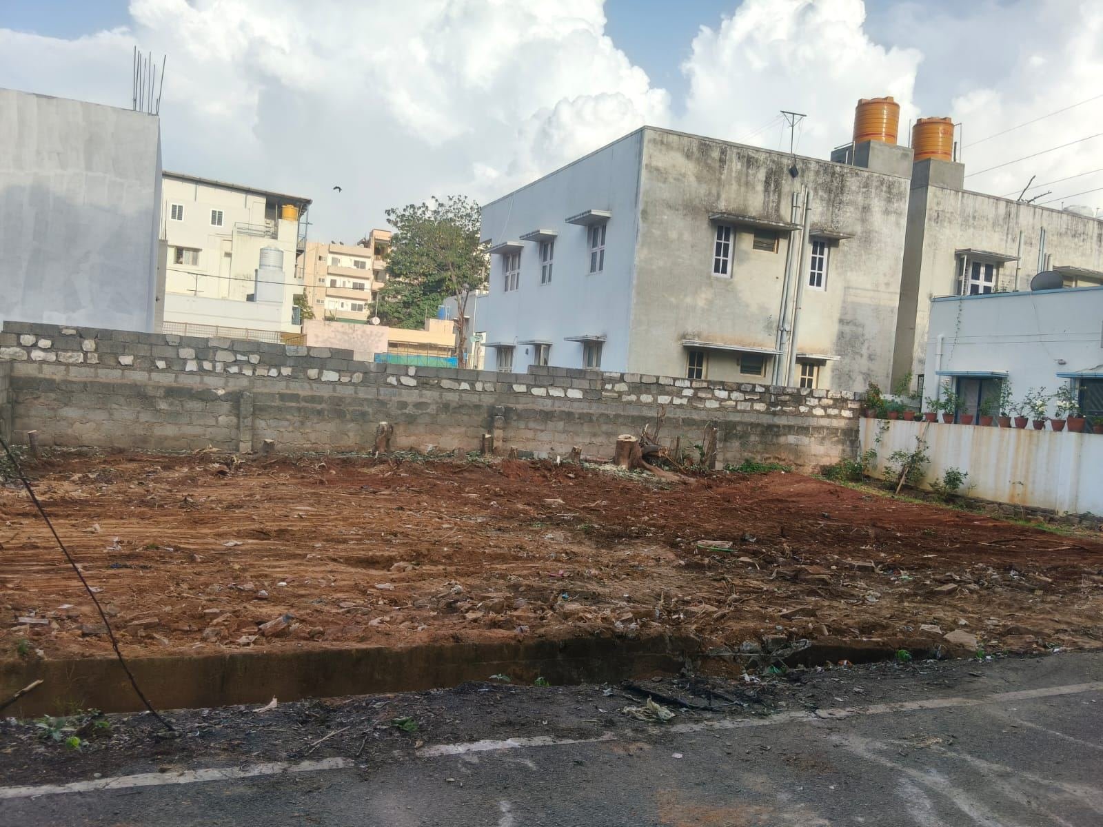PlotSafe field team inspecting a vacant plot on site